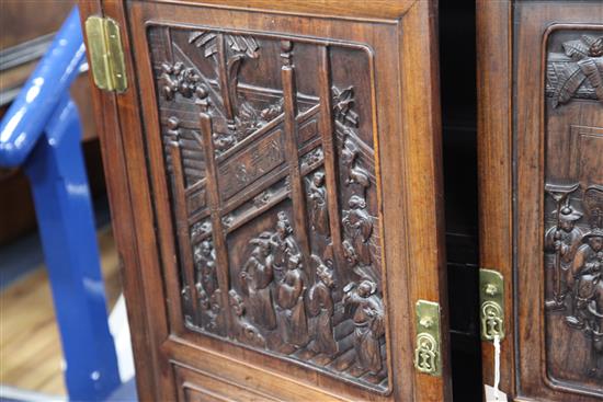 An early 20th century Chinese hongmu cabinet, W.3ft 9in. D.1ft 7in. H.3ft 11in.